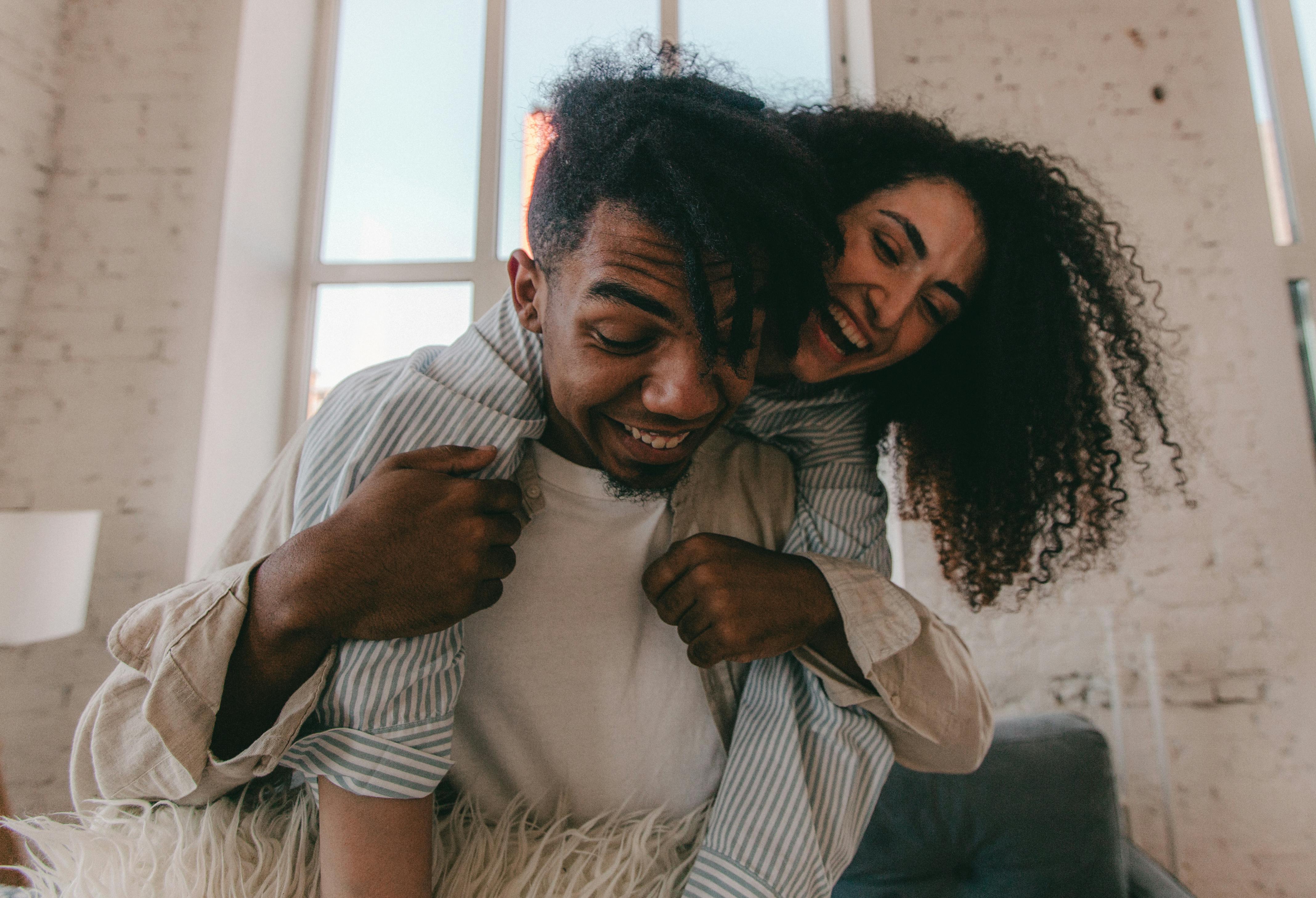 Happy Couple How Debt Settlement Affects Your Credit Report